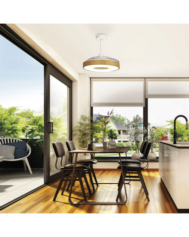 Ventilador plafón LED con aspas abatibles Coin sobre una mesa | Aiure