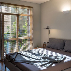 Aplique de pared en habitación Lip de Arkoslight | Aiure