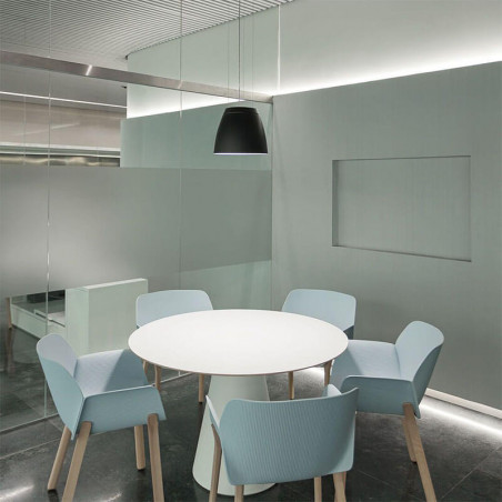 Black and white pendant light installed on the ceiling of an office from the Salt series by Arkoslight | Aiure