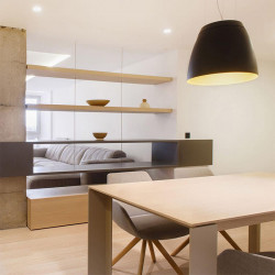 White and gold pendant light mounted on the ceiling of a kitchen from the Salt series by Arkoslight | Aiure