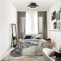 Tibet Mini black LED ceiling fan by Mantra in a bedroom| Aiure