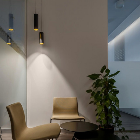 Scope 21 by Arkoslight illuminating on tabletop | AiureDeco