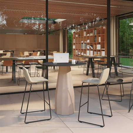 Maarten padded outdoor designer stool by Viccarbe in a garden| Aiure