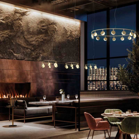 Shell ceiling lamps by Mantra in a restaurant | Aiure