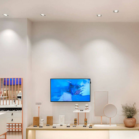Focos LED empotrables Orbital Mini en techo de tienda - Arkoslight | Aiure